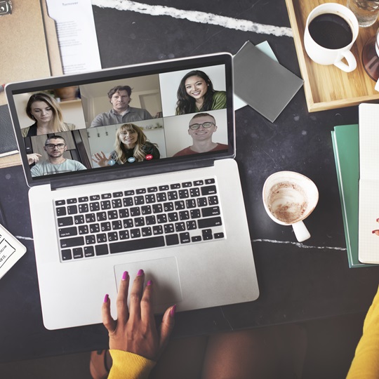Happy vibrant people on a conference call